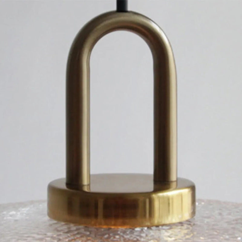 Lampada a sospensione in vetro trasparente Lena in ottone 20.webp__PID:0da9139e-6385-4639-a8e2-94f21261bd2d