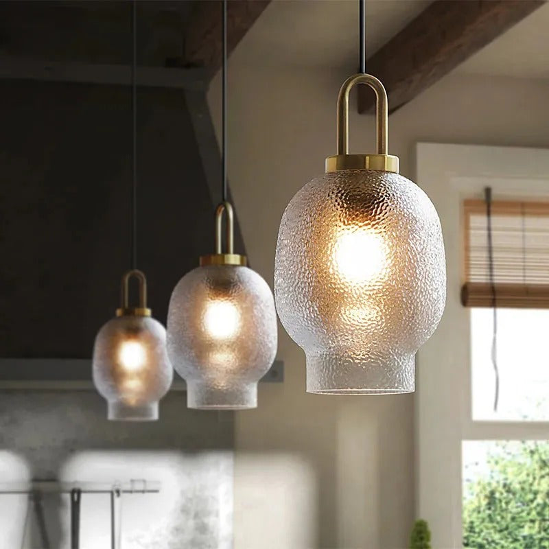 Lampada a sospensione in vetro trasparente Lena in ottone 4.webp__PID:85363968-e294-4212-a1bd-2d3d44fd35f0