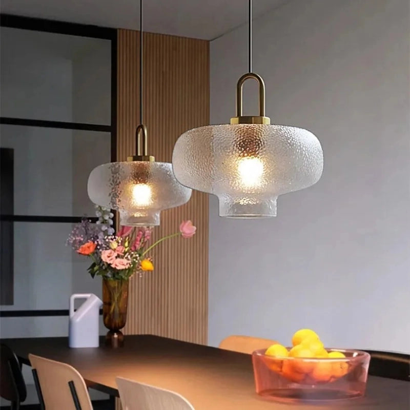 Lampada a sospensione in vetro trasparente Lena in ottone 2.webp__PID:3968e294-f212-41bd-ad3d-44fd35f027c8