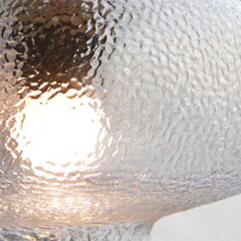 Lampada a sospensione in vetro trasparente Lena in ottone 21.webp__PID:a9139e63-8536-4968-a294-f21261bd2d3d
